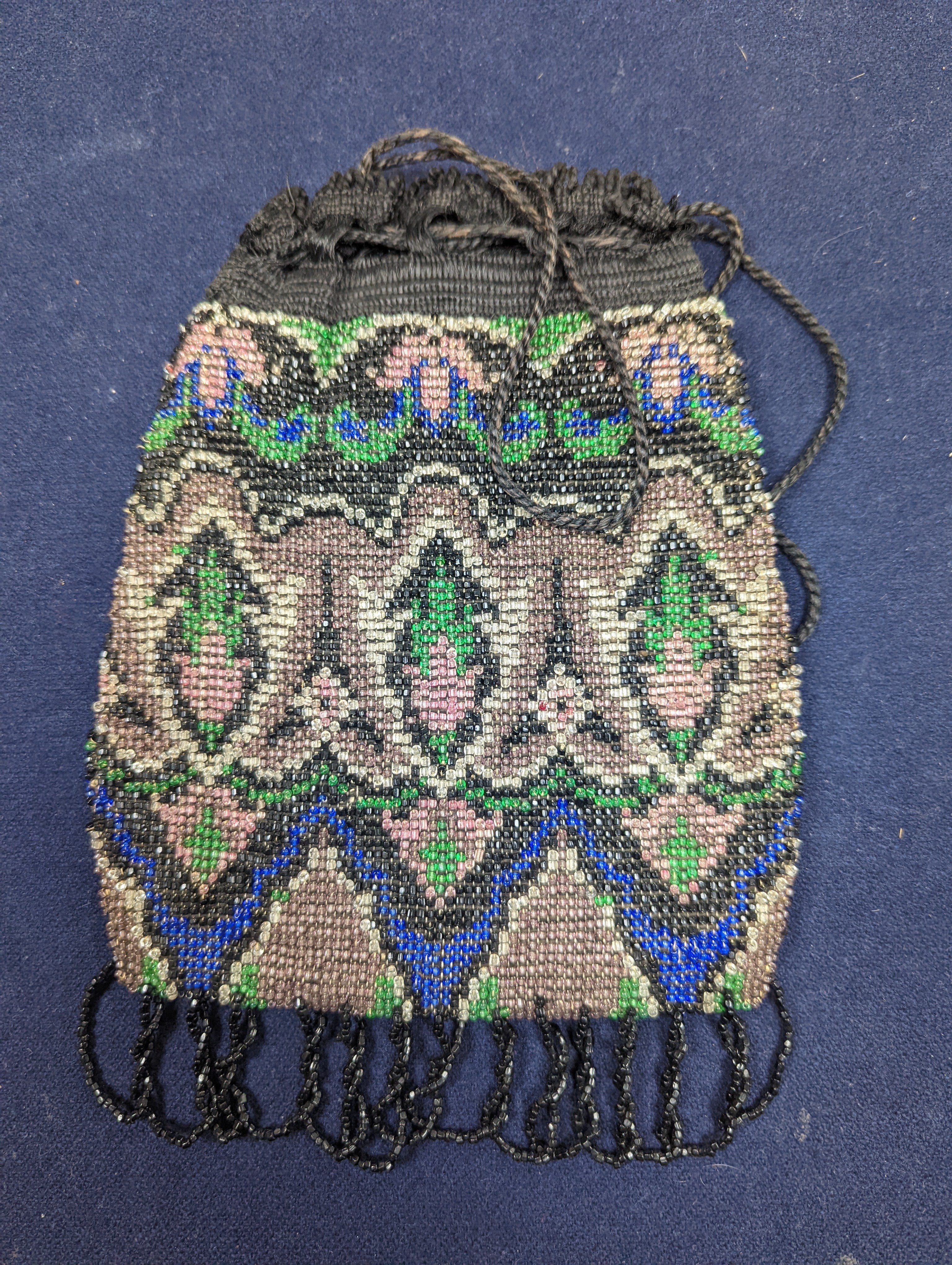 A fine tapestry clutch bag together with a collection of beaded petit point and lurex evening bags (7)